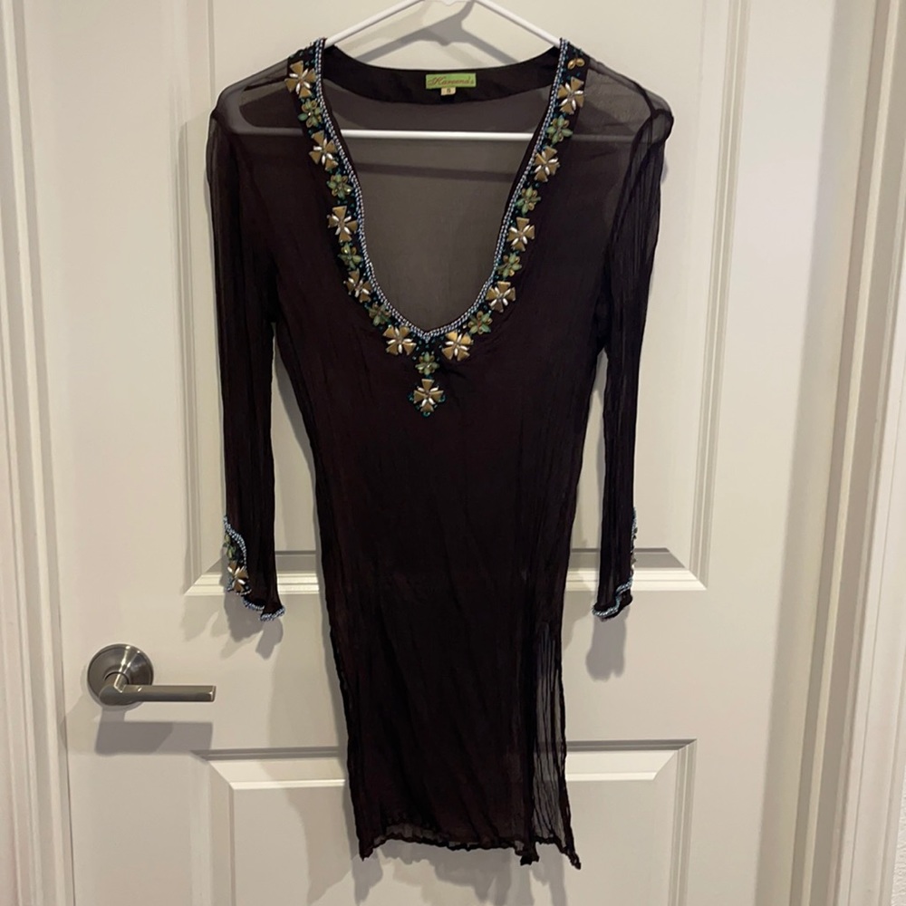 Gorgeous bathing suit coverup from Kareenas in size small.